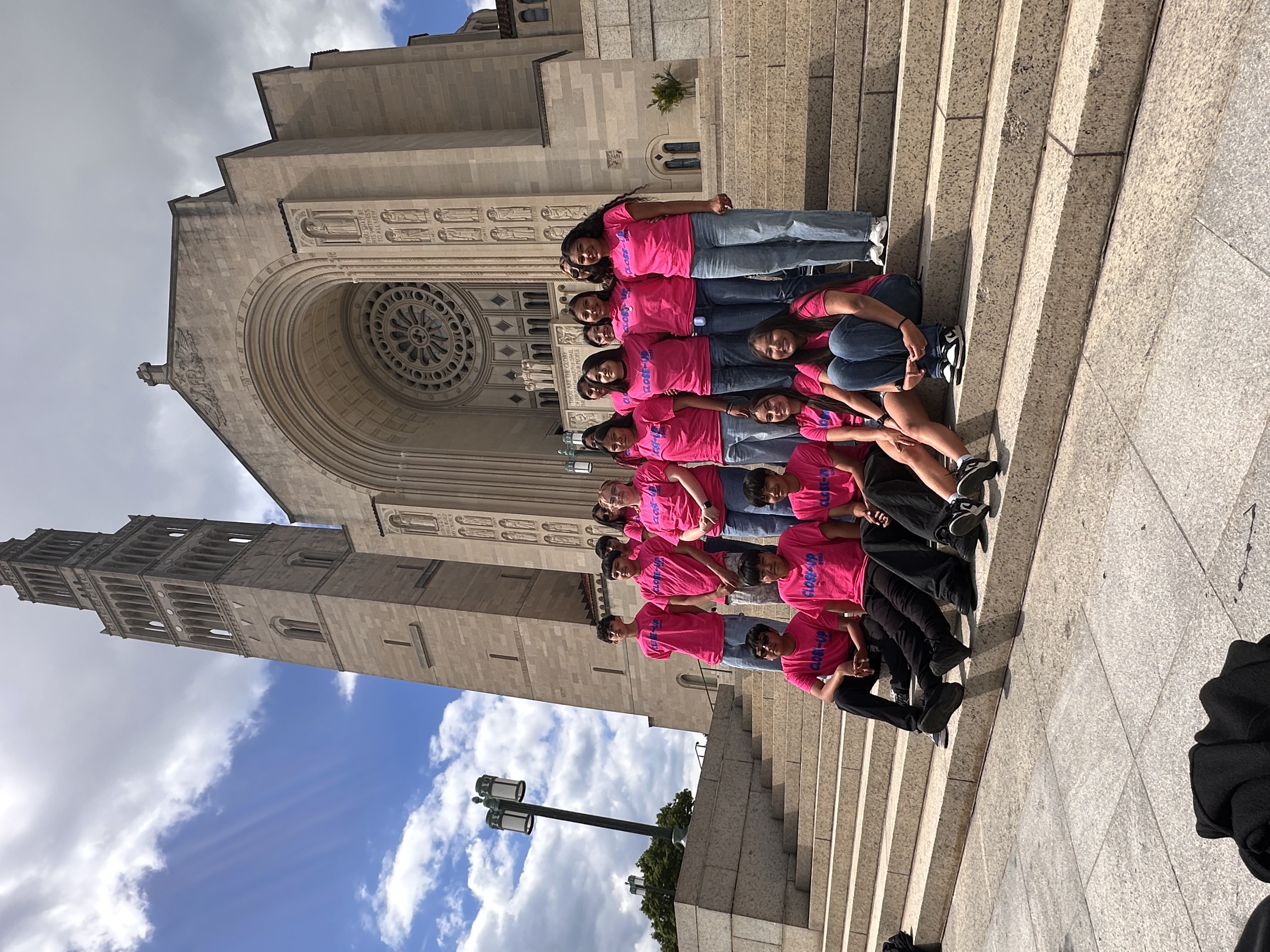 Students in front of a church posing