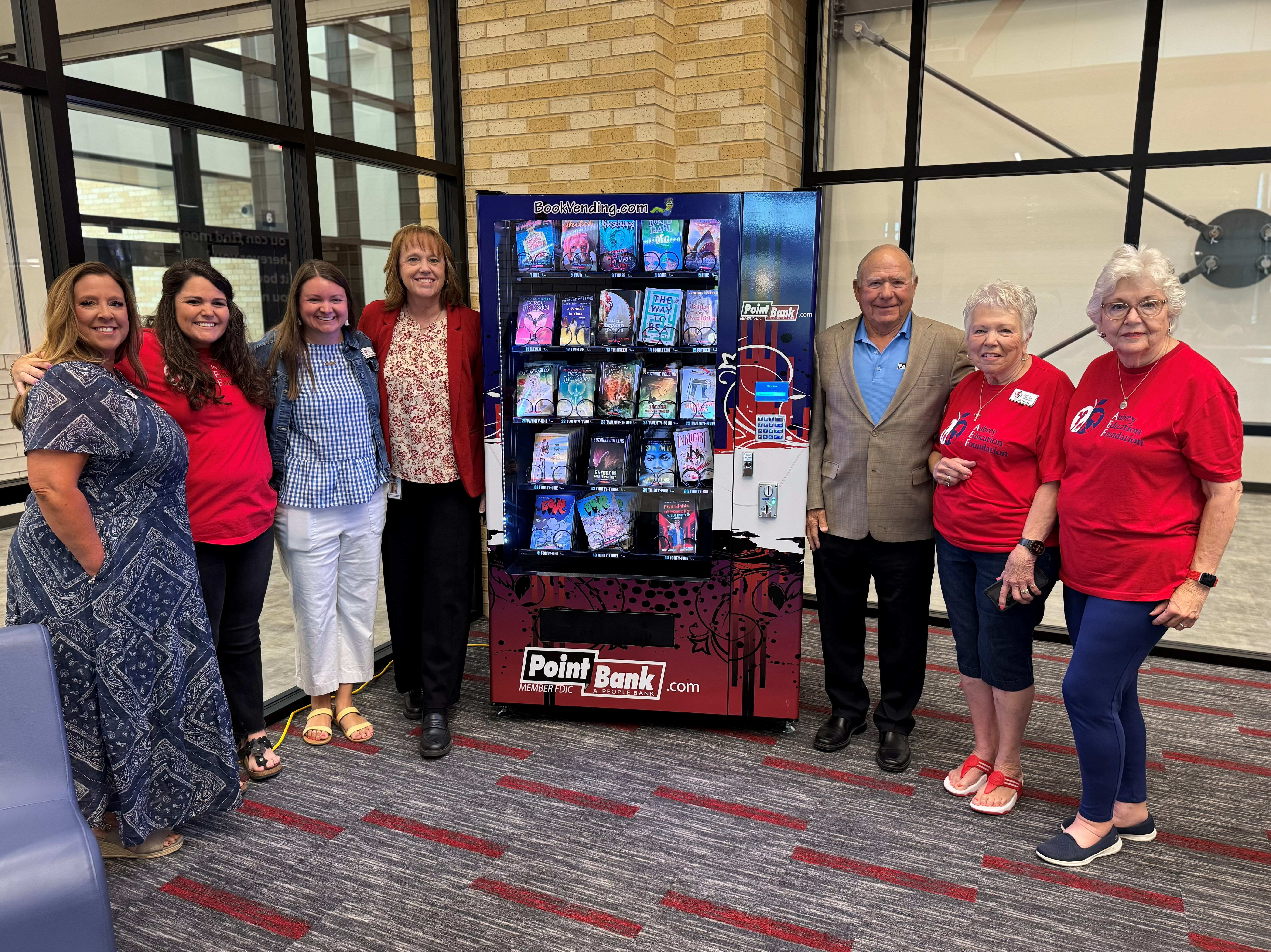 Owens Middle School PointBank Book Vending Machine Unveiling group photo with Aubrey Education Foundation, Aubrey ISD and PointBank leaders