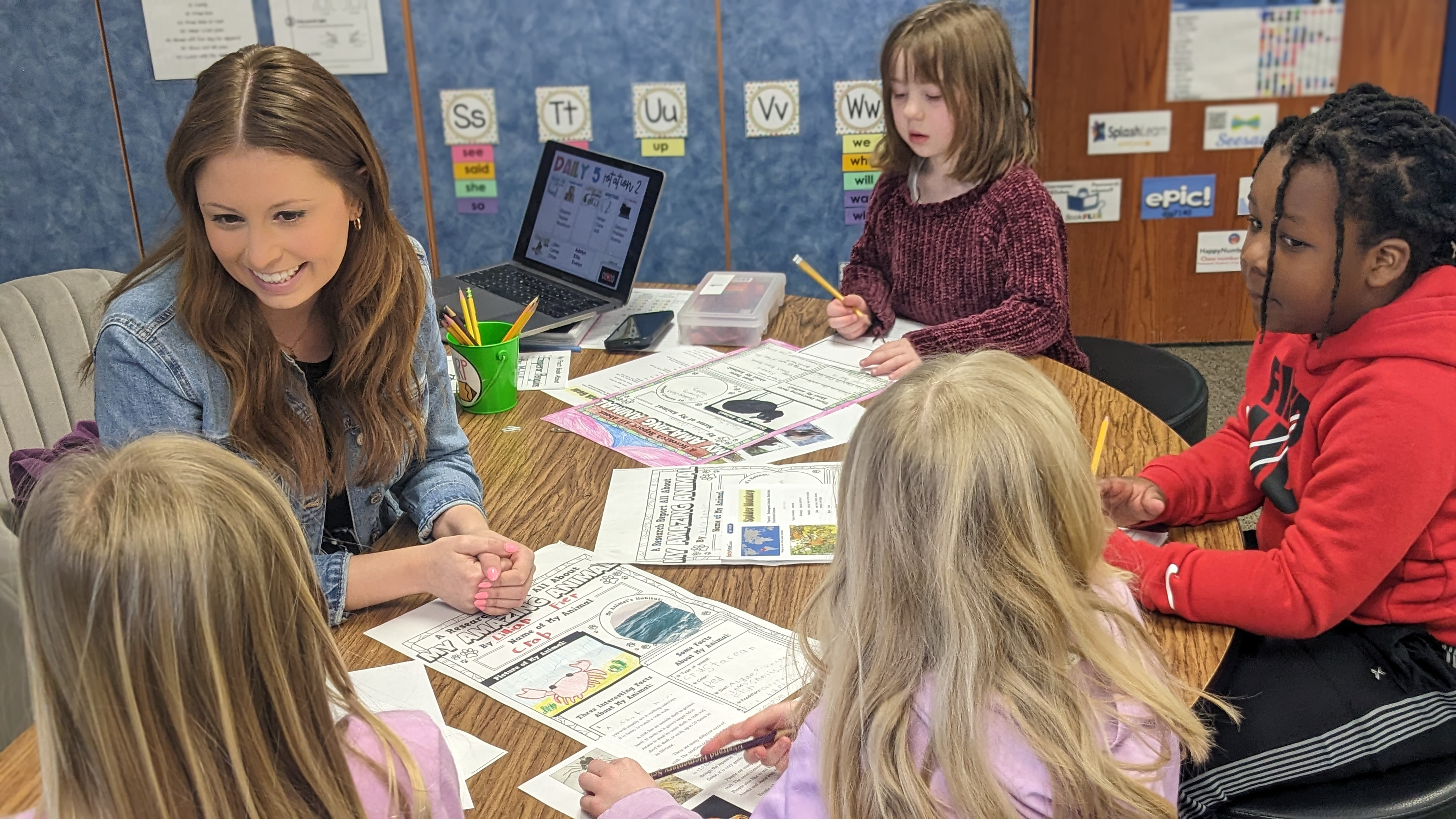 Kindergarten students working on a project