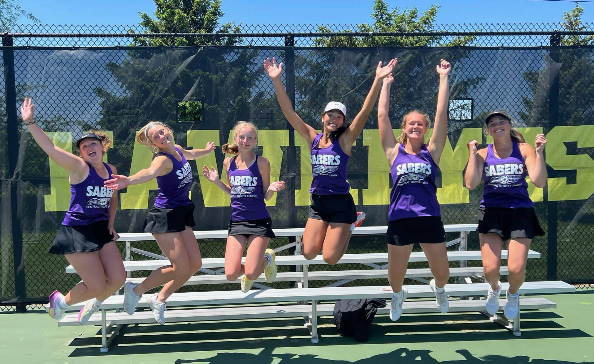 Saber Girls Tennis Team celebrating