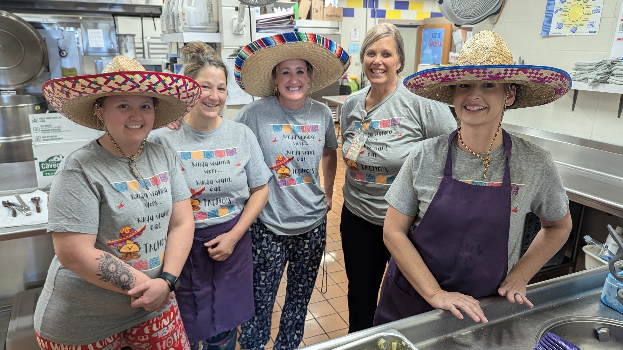 CDIS Nutrition Services Department in photo booth during National School Breakfast Week