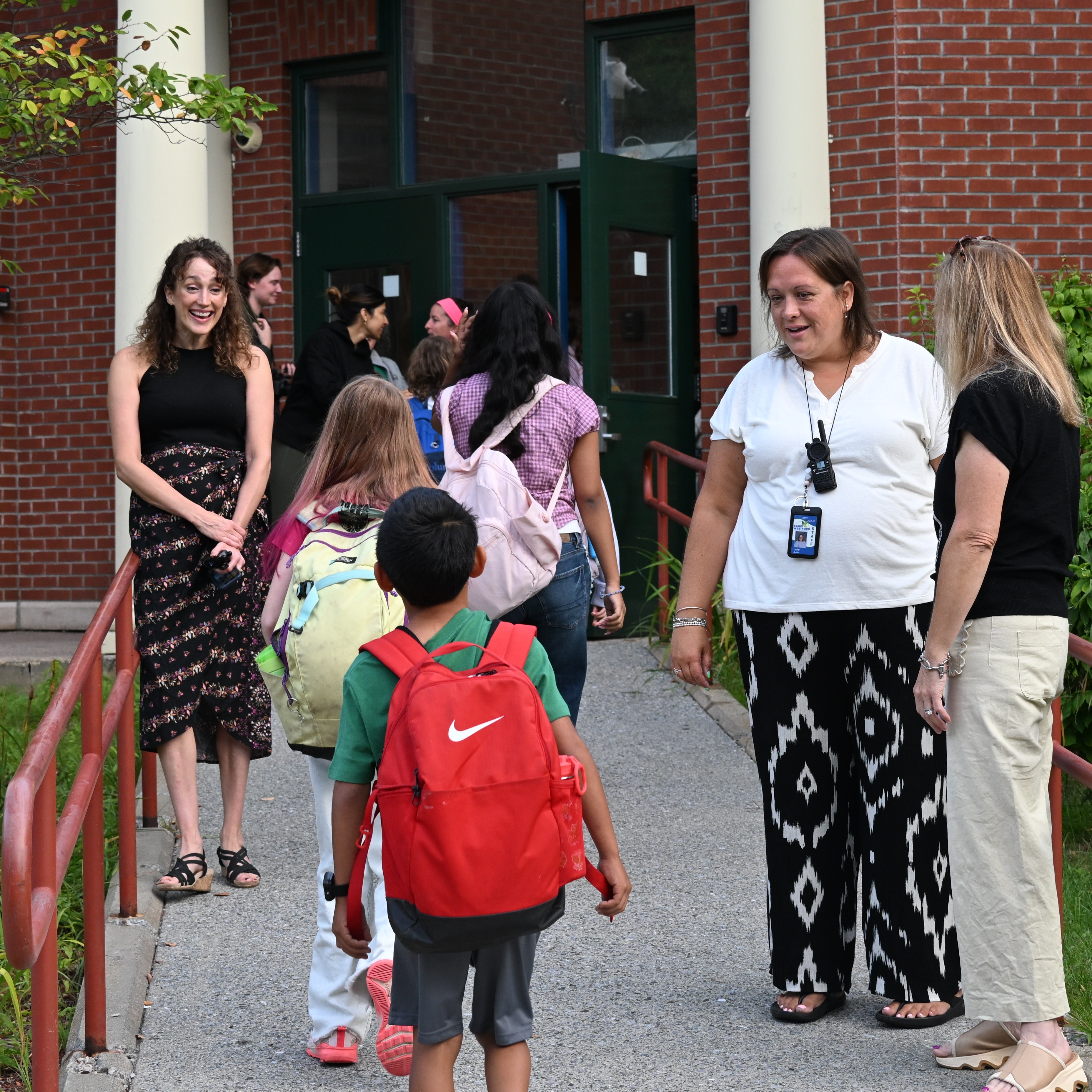 Teachers welcoming students