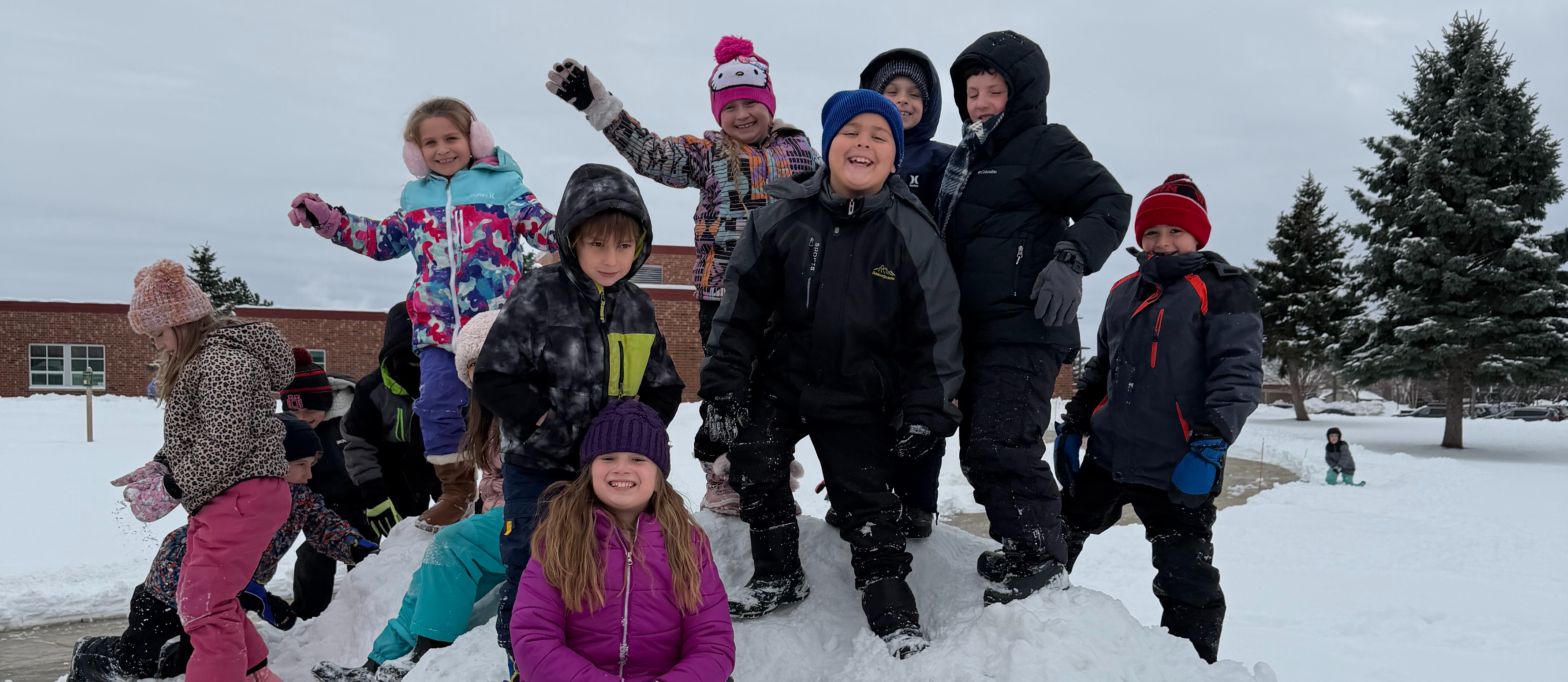 2nd graders playing in the snow