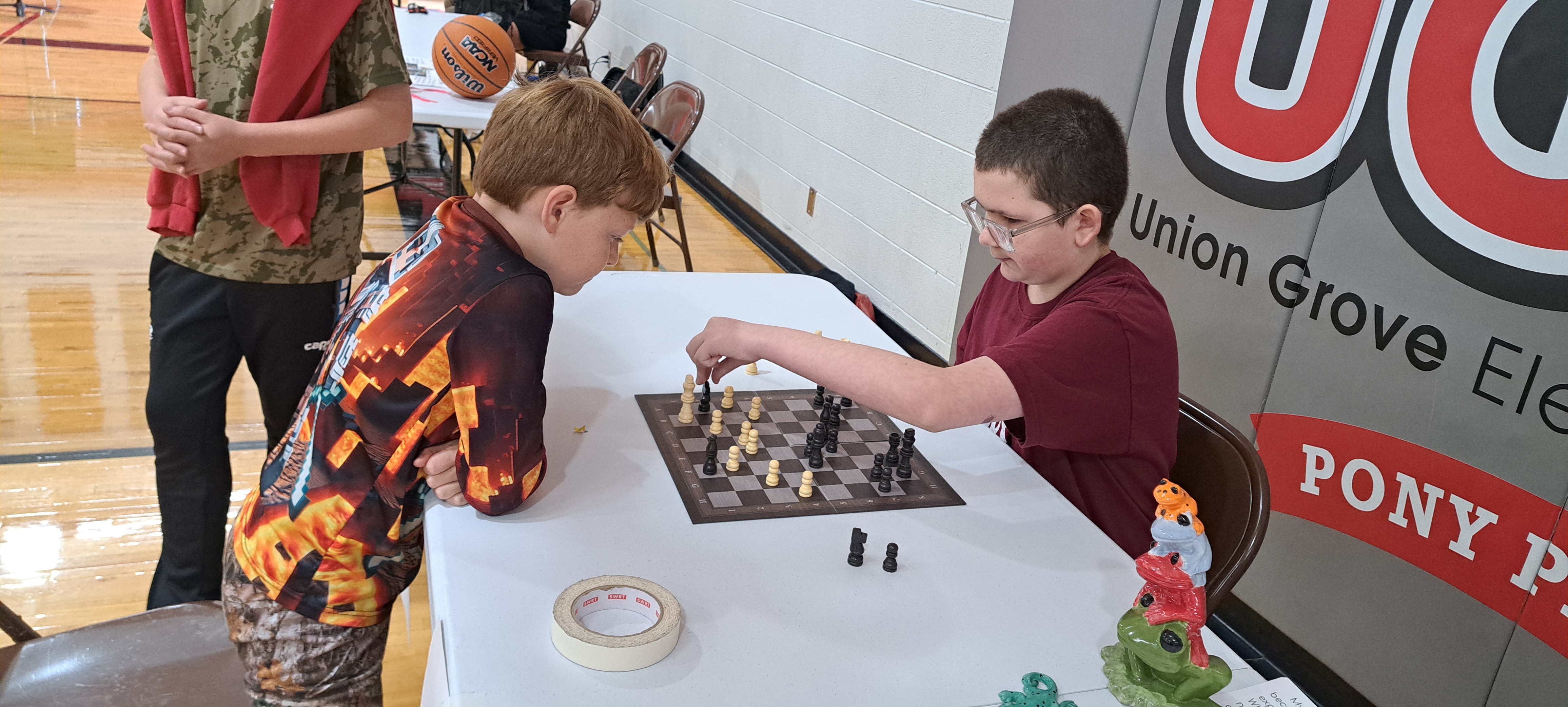 two students playing chess