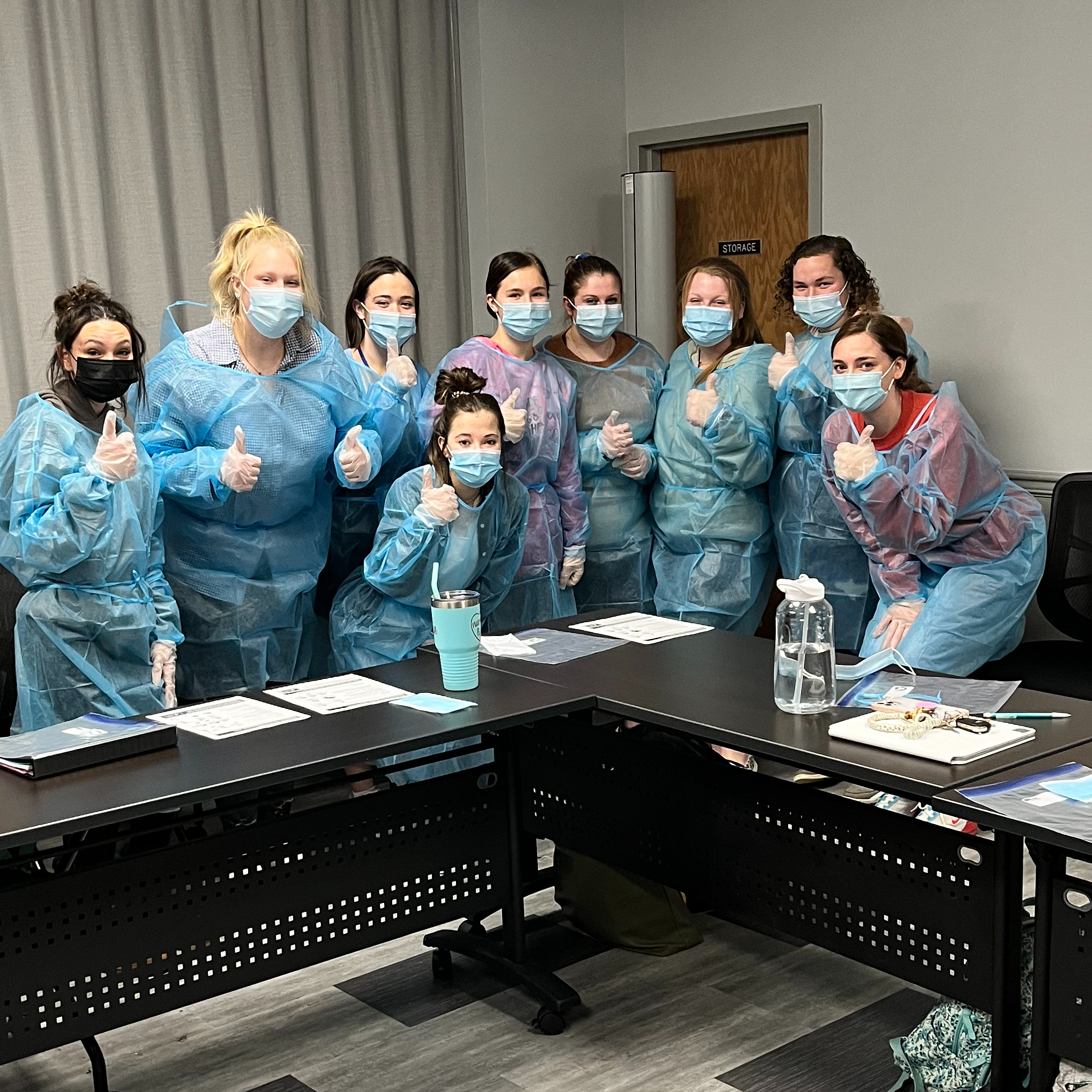 Group of students posing together in medical gear
