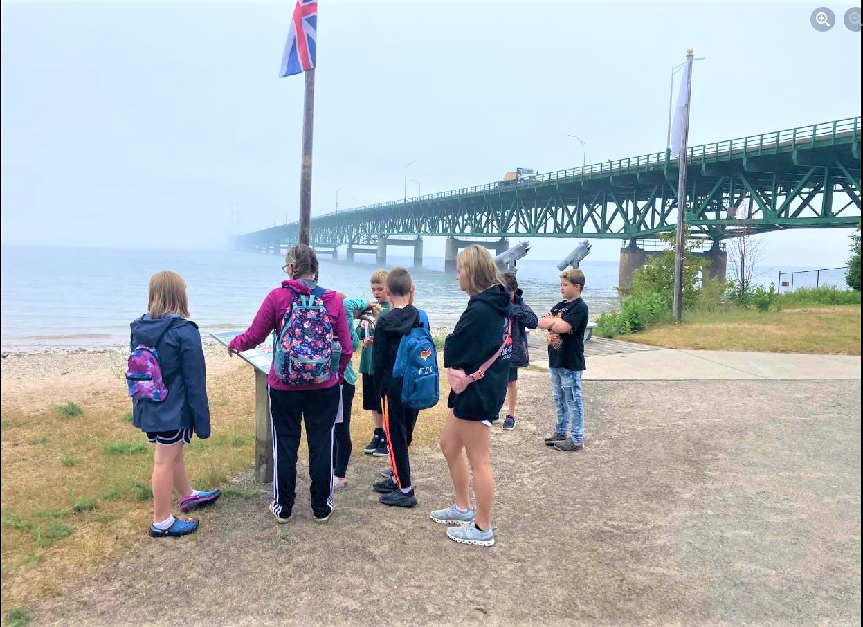 Students standing near bridge