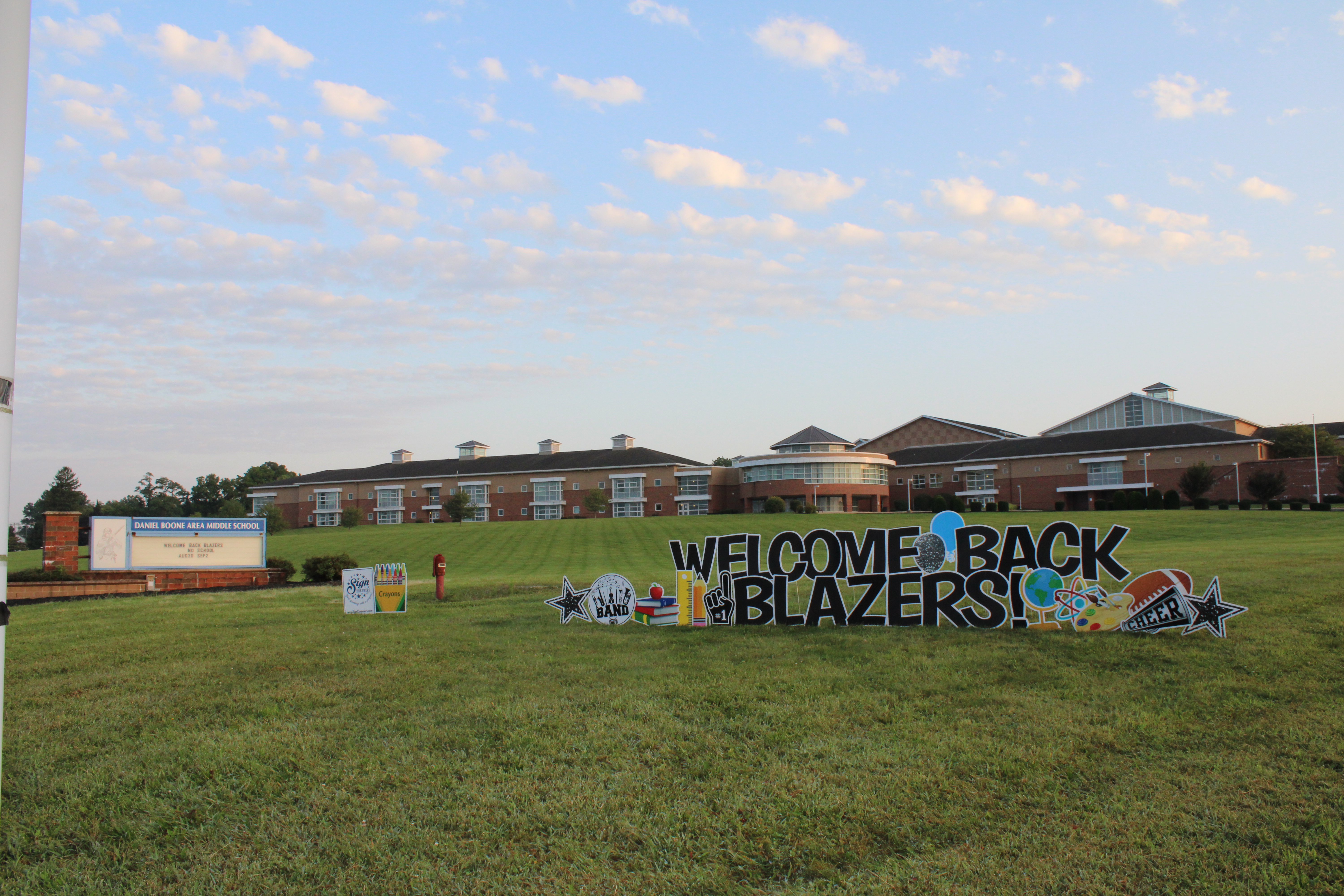 Picture of DBAMS with WELCOME BLAZERS sign