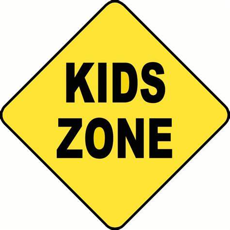 A yellow traffic sign with the words "Kids Zone" inside.