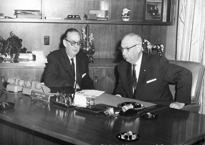 Joe Steele and Shelby Ford at First State Bank, Springdale, 1960s–1970s. Bruce Vaughan, photographer. Bruce Vaughan Collection (S-93-84-69)