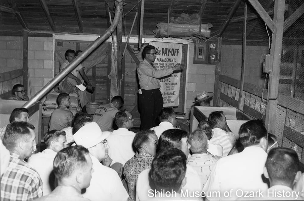 Jerry Hinshaw teaching at a school for poultry growers at Arbor Acres, Springdale, July 1961. Howard Clark, photographer. Caroline Price Clark Collection (S-2002-73-30)