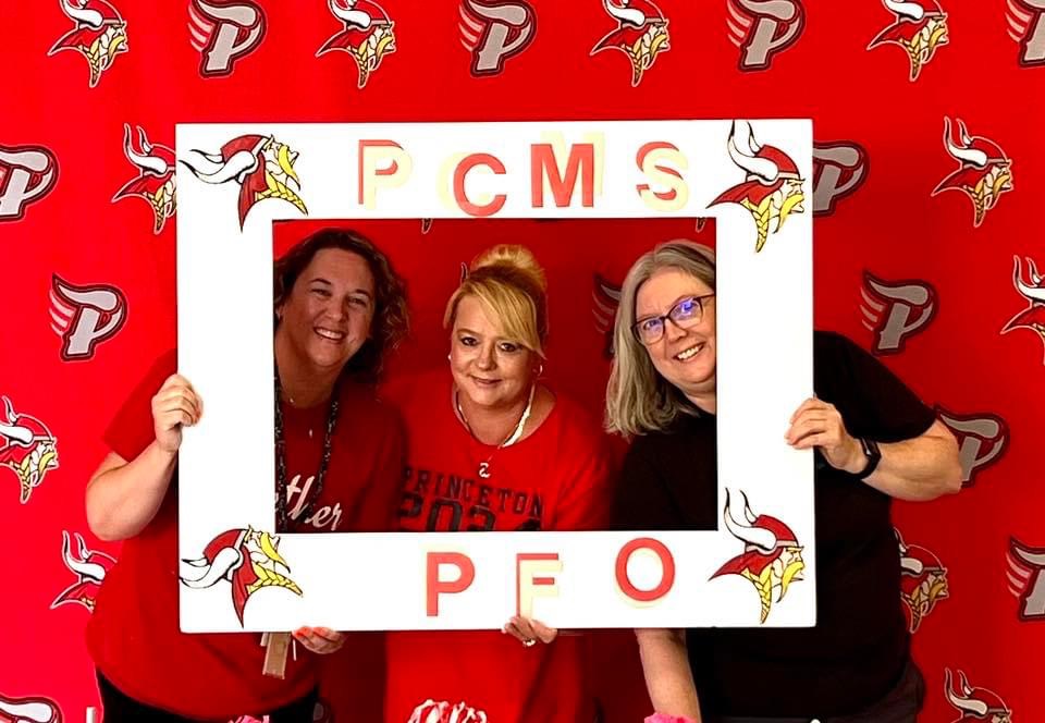 PCMS PFO photo of volunteers with frame