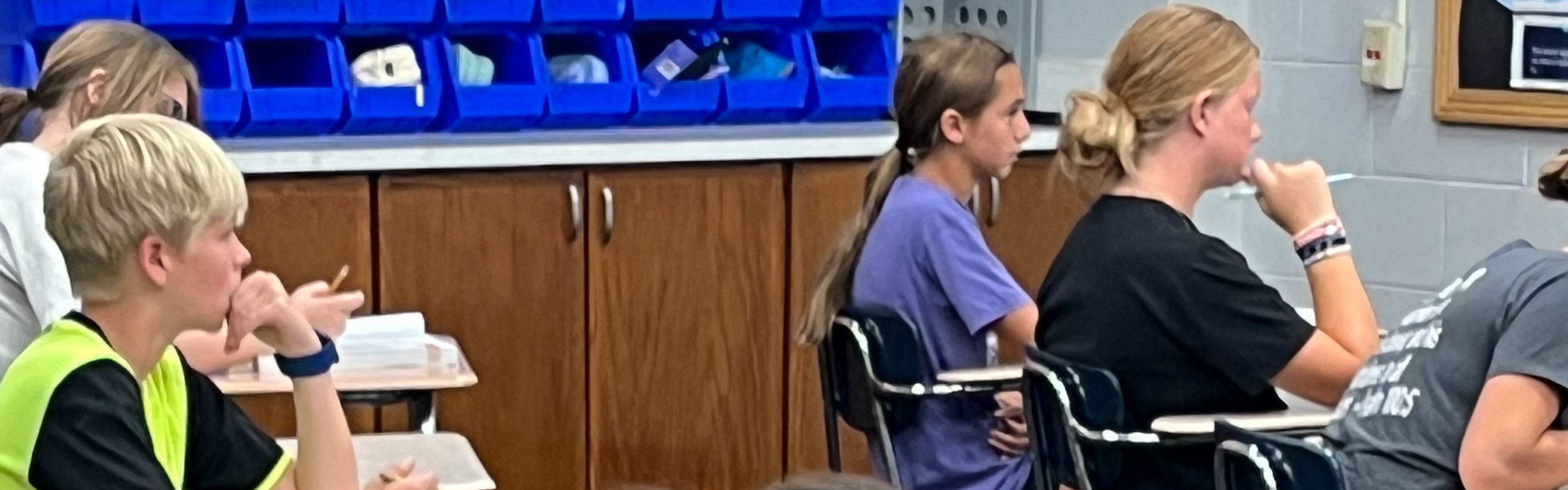 5th grade students working hard in their desk. 
