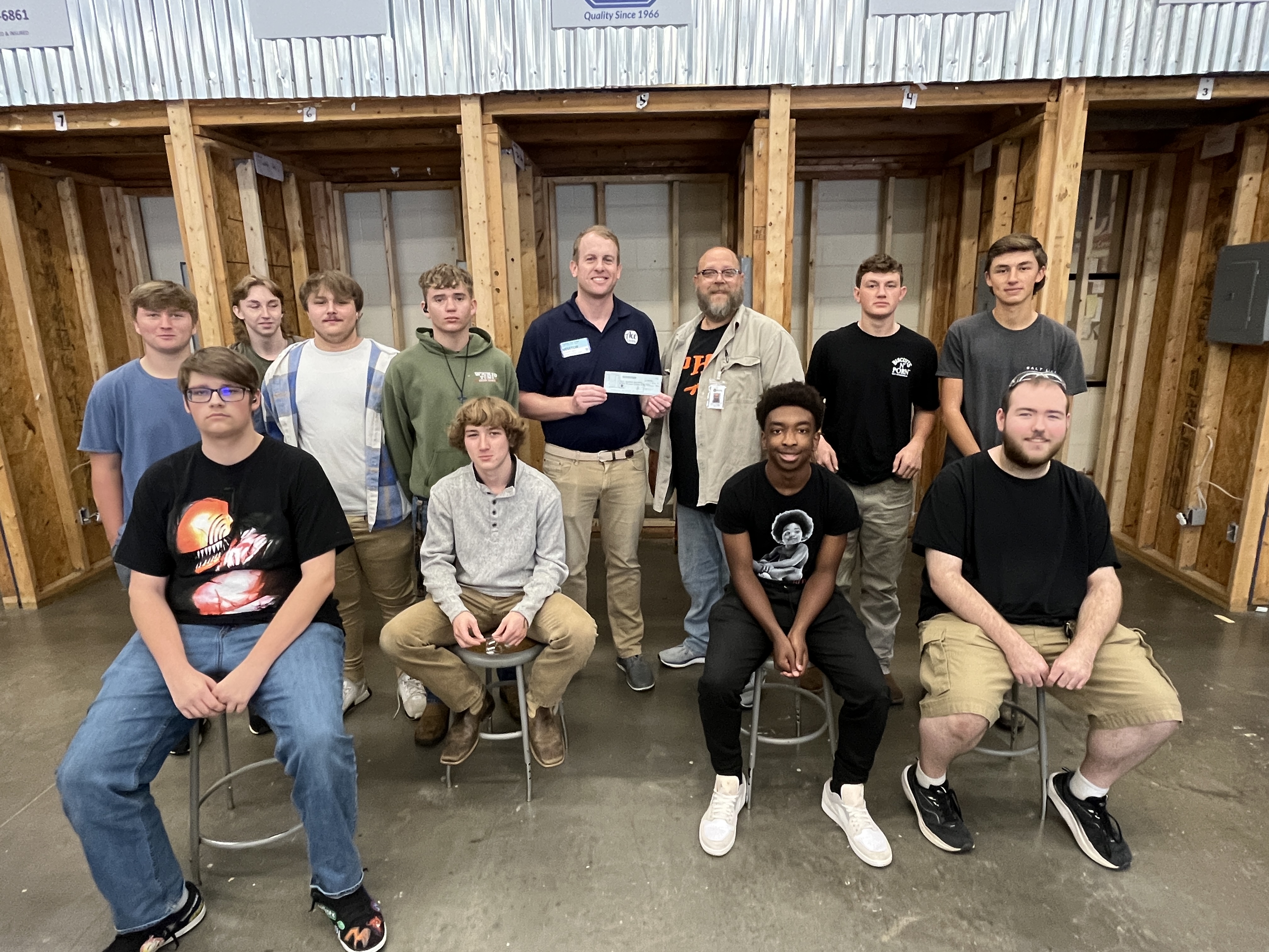 students sitting in a group in the shop