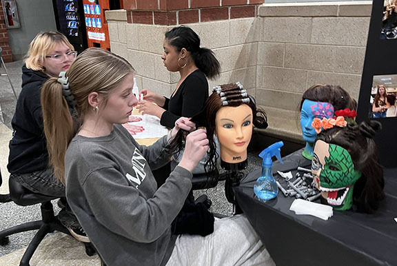 student doing hair