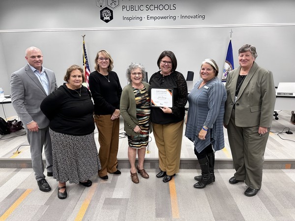 Jill Dewey with School Board members