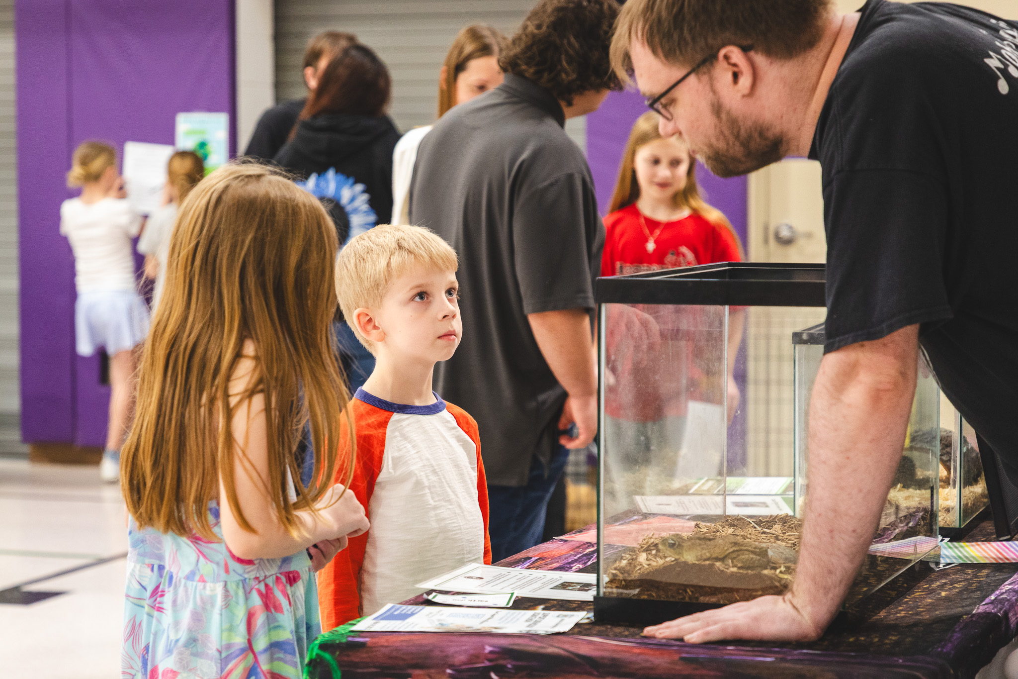student at an earth day event