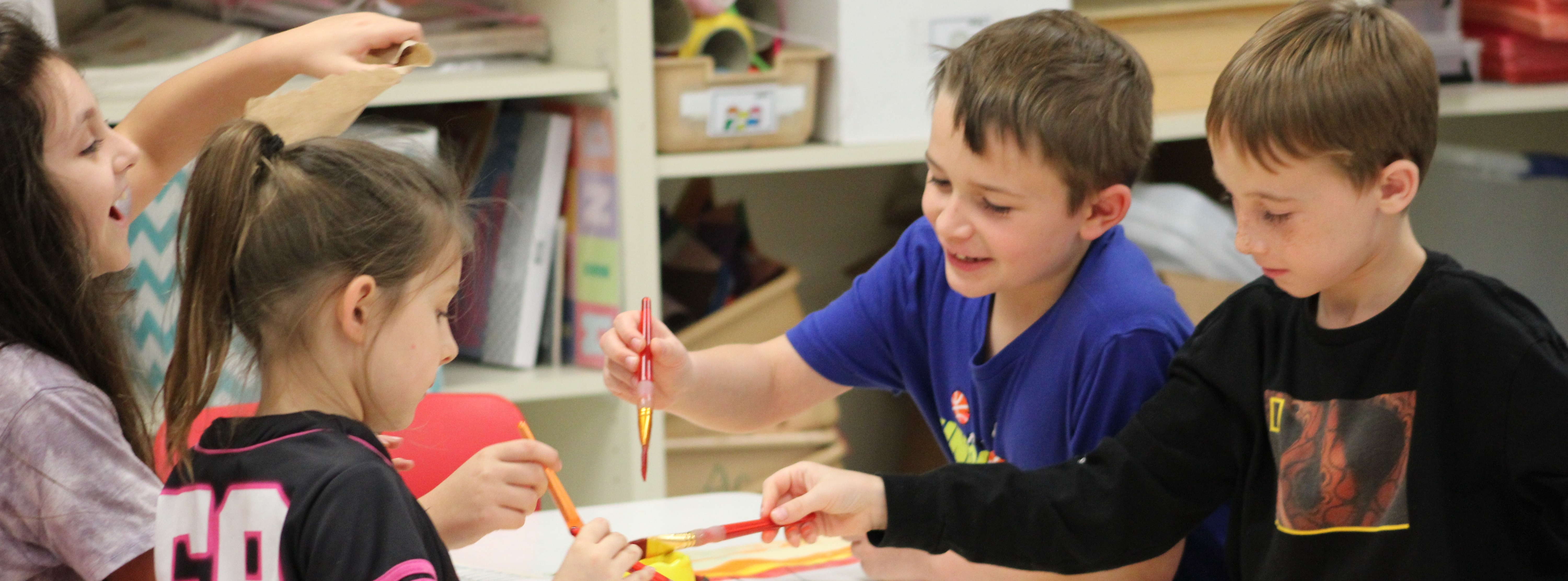 Students having fun painting