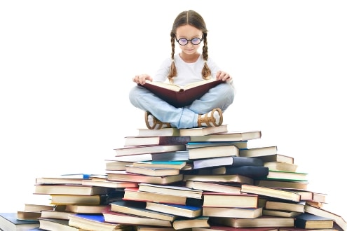 Girl Reading in a pile of books