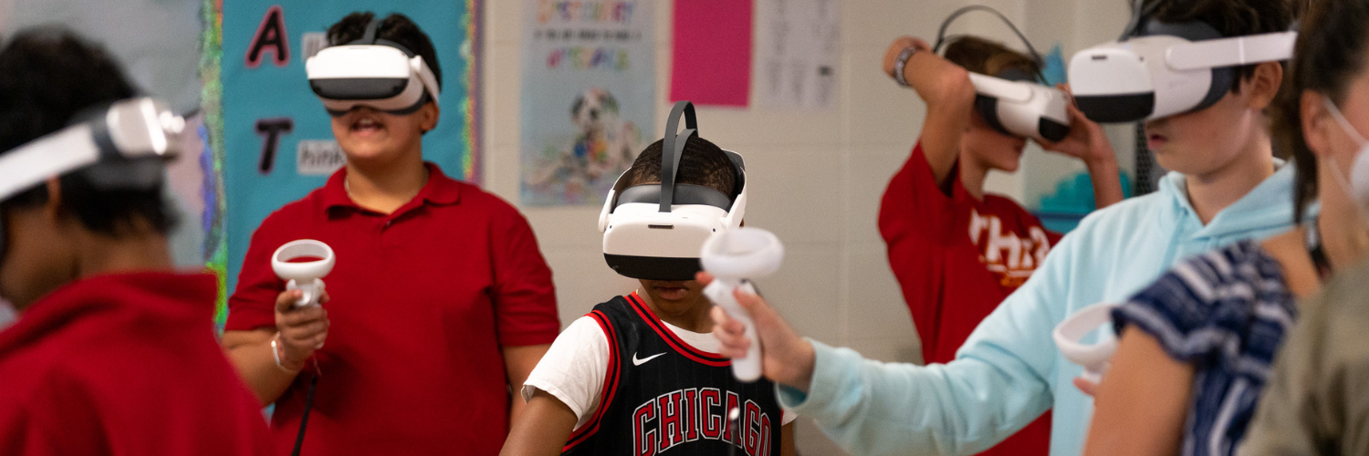 Kids wearing VR headsets