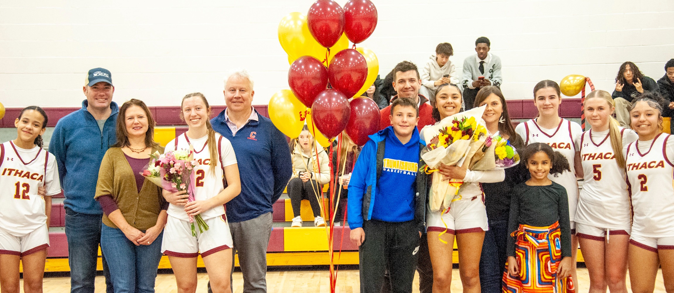 Ithaca varsity volleyball senior night - students and family members