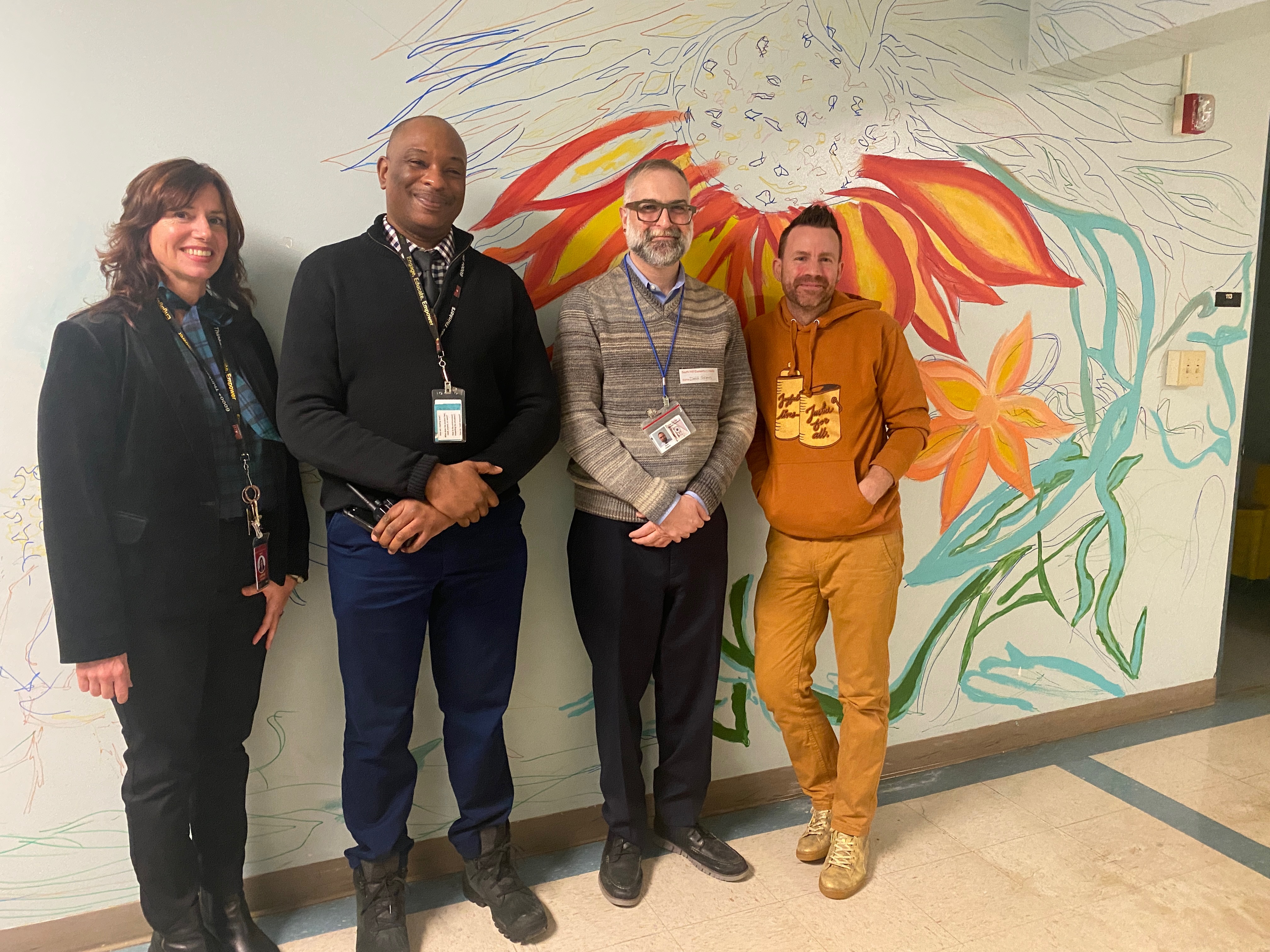 Daphne Shululu, Arthur Brown, David Seligman from NYSED pose for a photo in South Hill Elementary