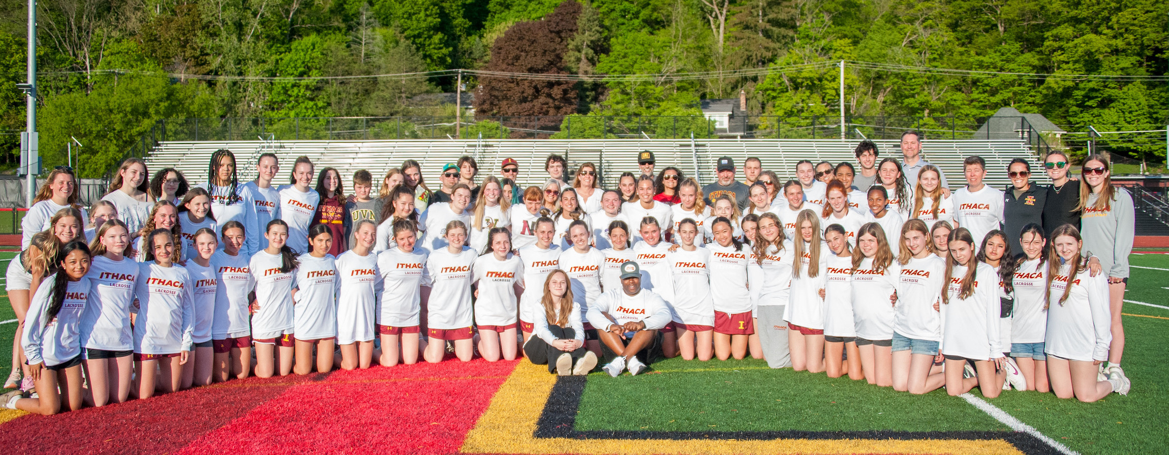 Ithaca varsity girls lacrosse senior night - students and family members