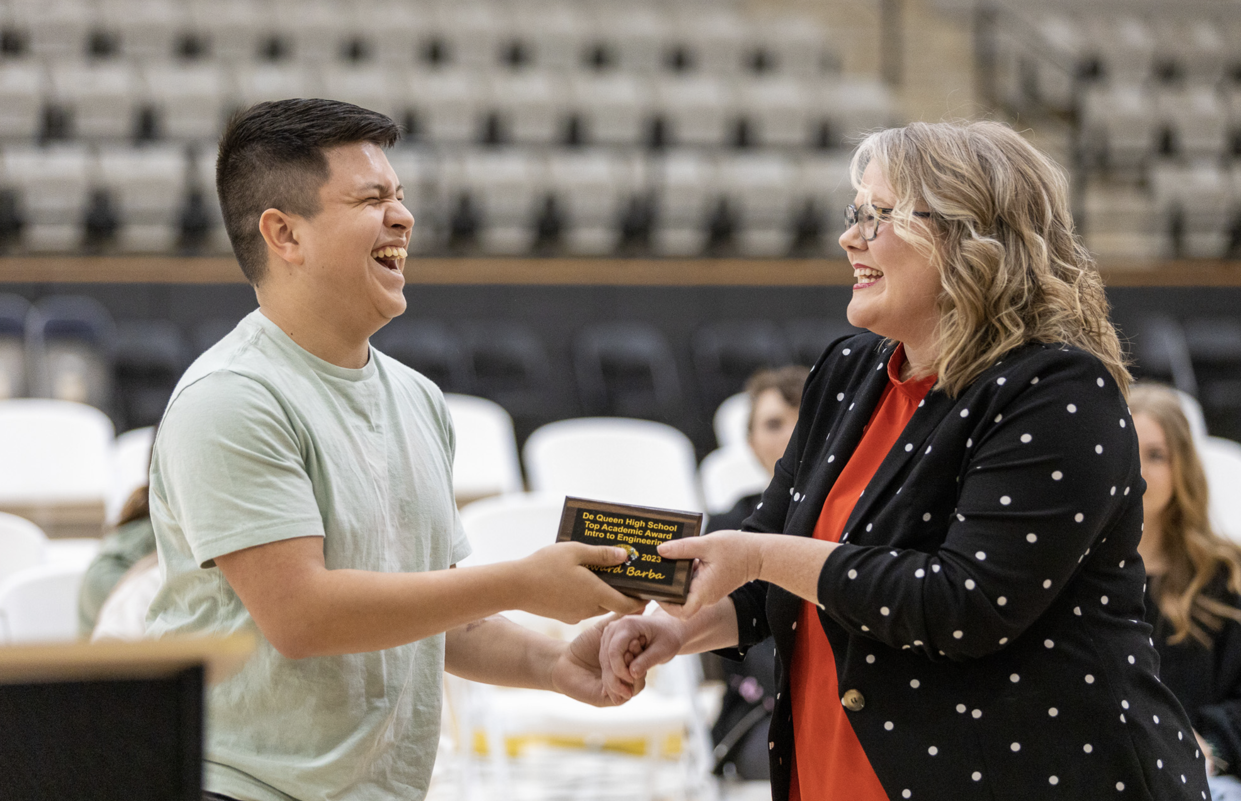 Student accepting award