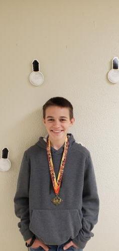 student with medal