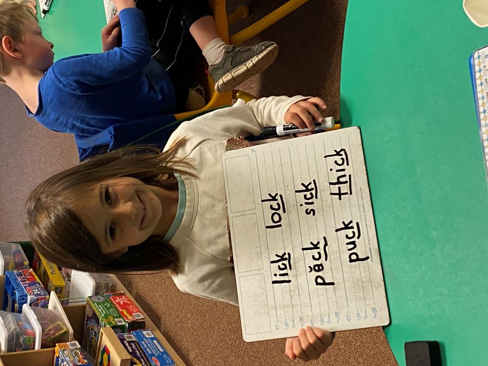 Dylan Beebe showing off her written phoenic spelling