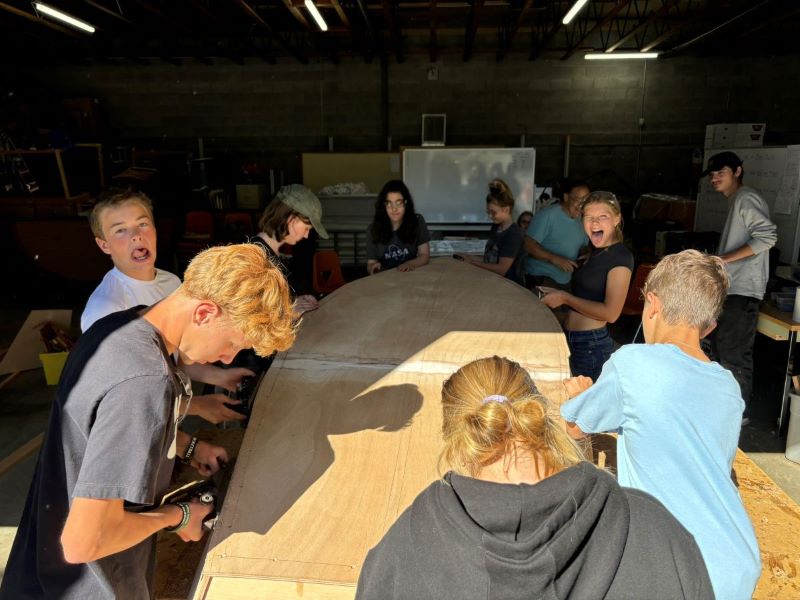 8th grade group works on the new boat