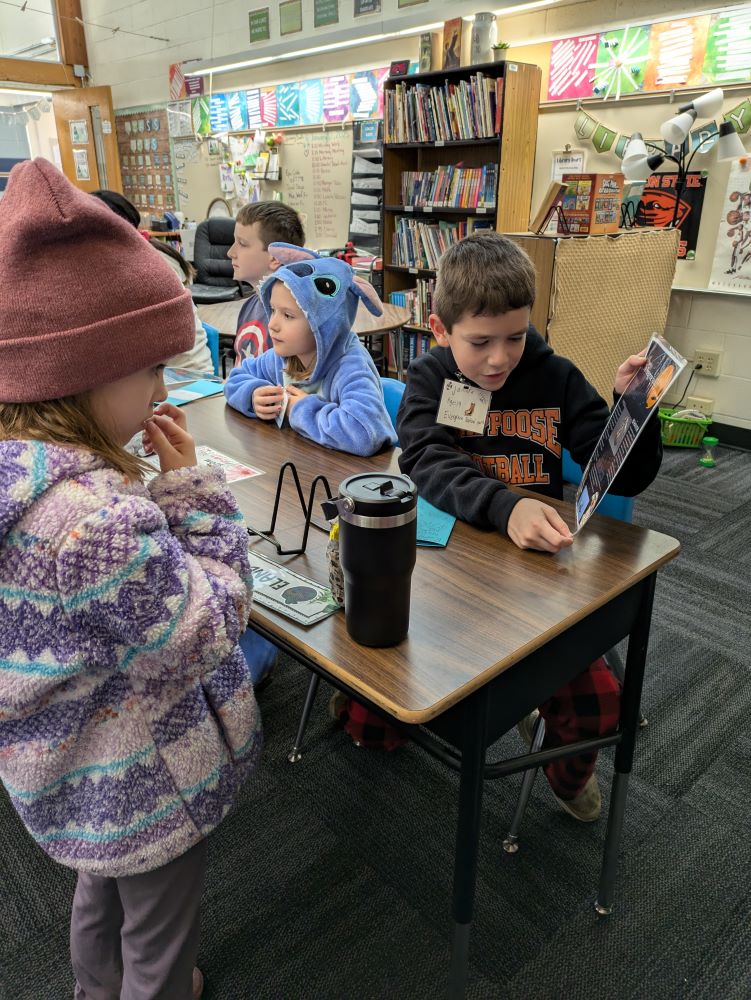 Eland reads with classmates