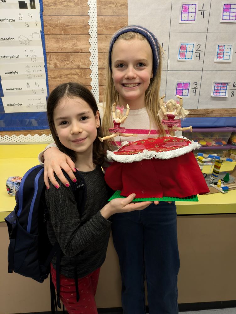 Lenna and Etta showing off their creations