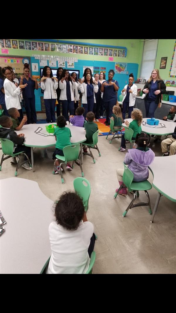 doctors at a kids classroom