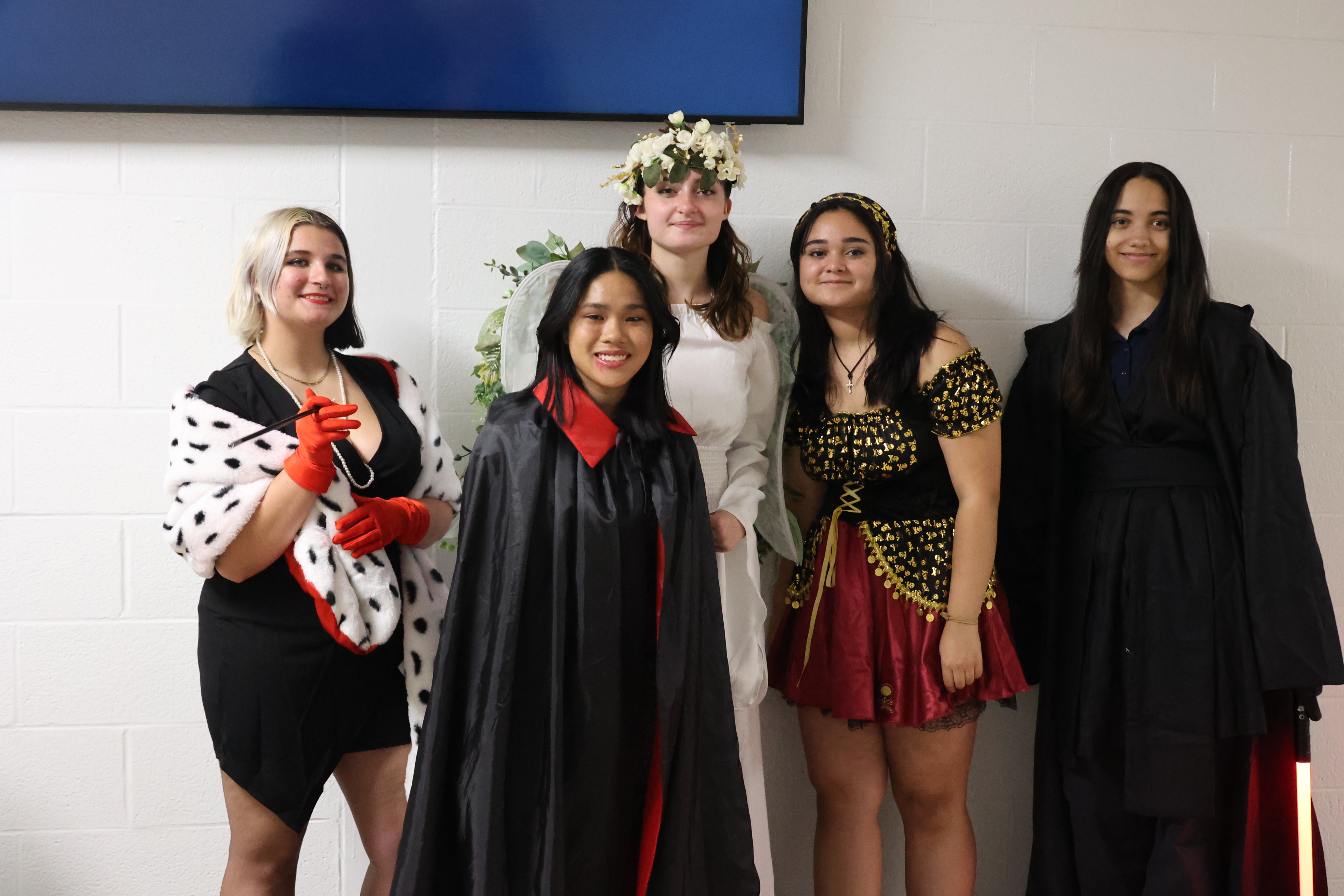 ECCC students in a variety of costumes pose
