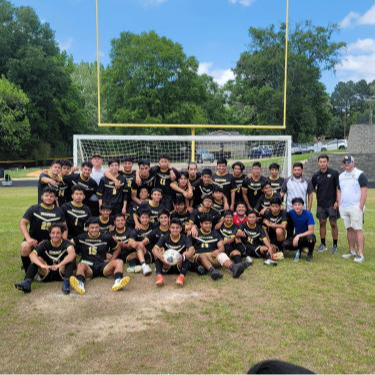 soccer team group picture on the field