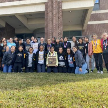 cross country team group picture outside