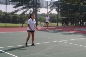 two tennis players on the court