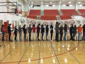 group picture shooting bow and arrow