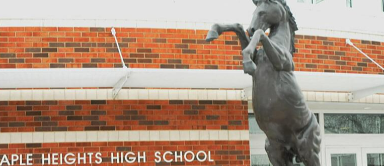 front of Maple Heights High School with Mustang