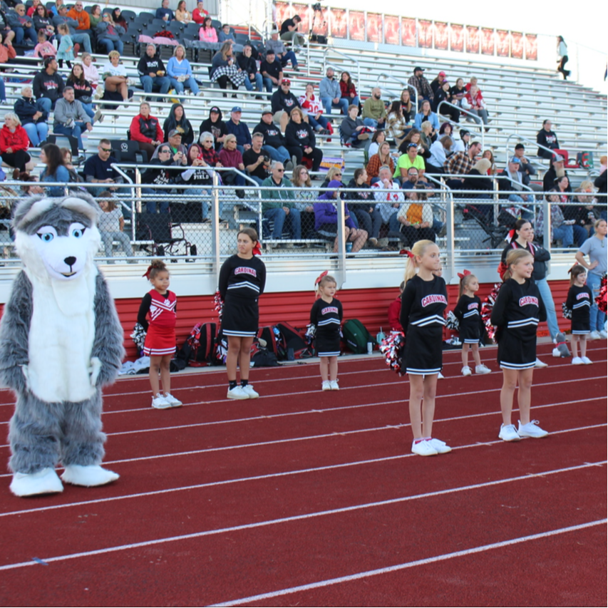The fans and cheerleaders get ready to cheer the football team on to victory, Friday night!