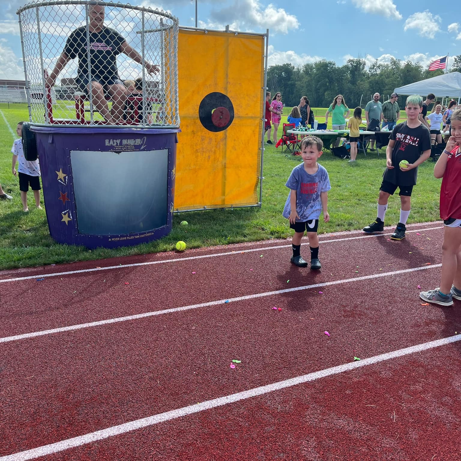 Students try to dunk Mr. Cunningham at the Back-to-School Bash. 