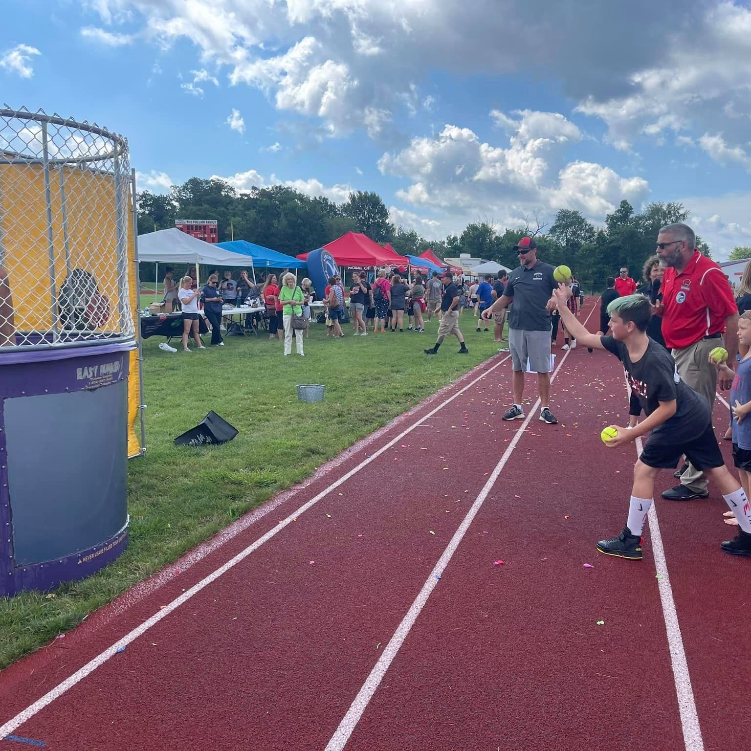 Students try to dunk Mr. Cunningham at the Back-to-School Bash. 