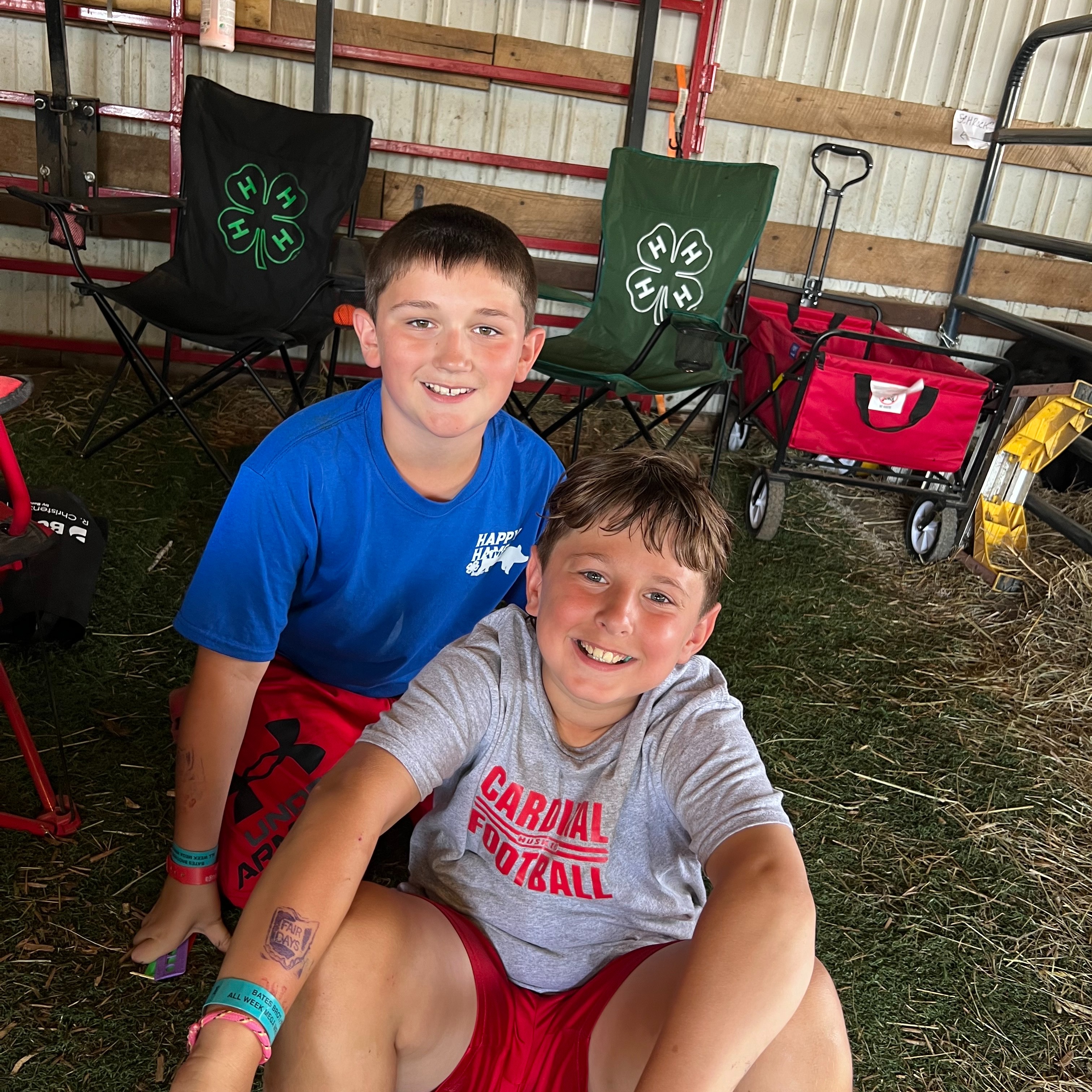 Seth R. and Jesse S. show cows at the Geauga County Fair. 