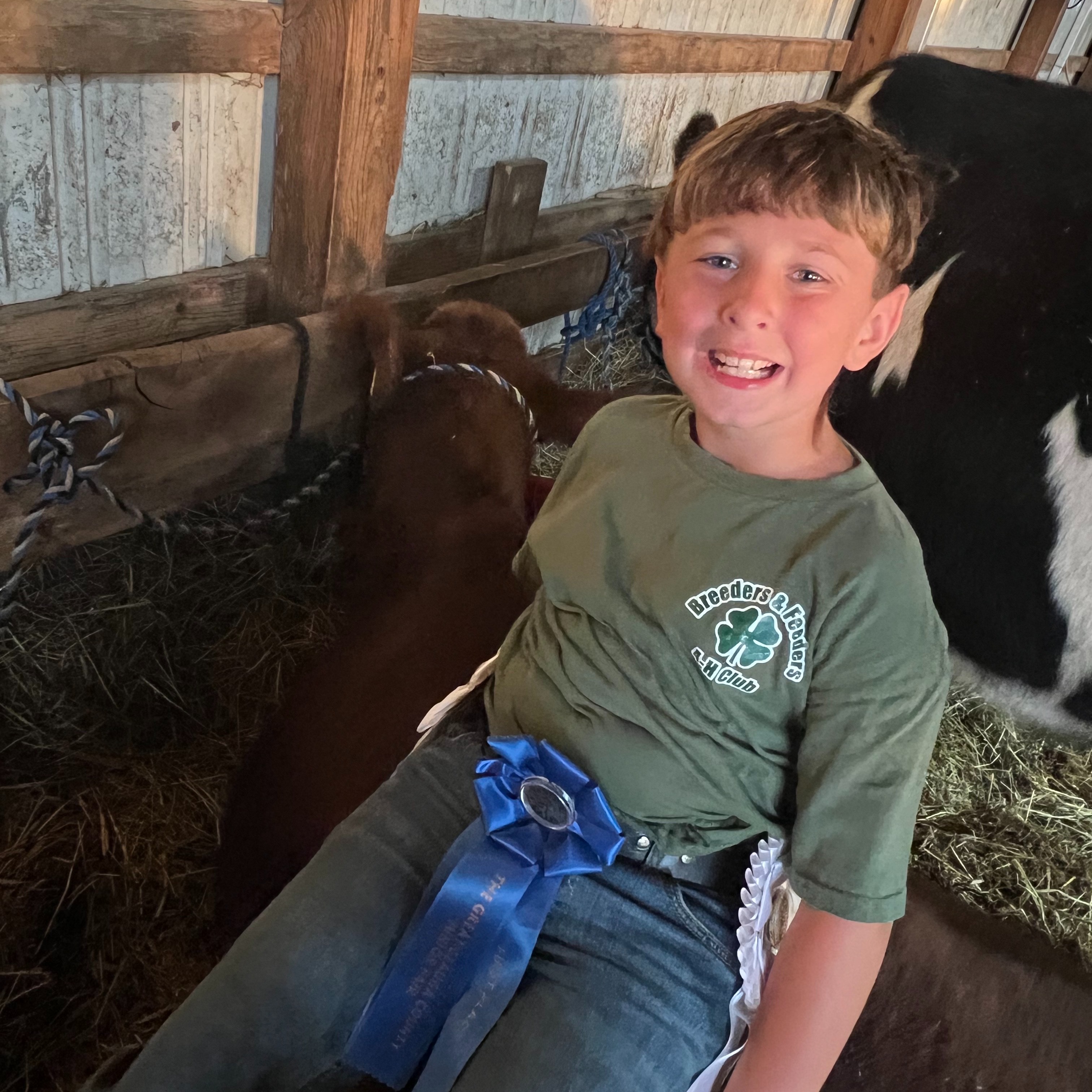 Seth R. shows cows at the Geauga County Fair. 