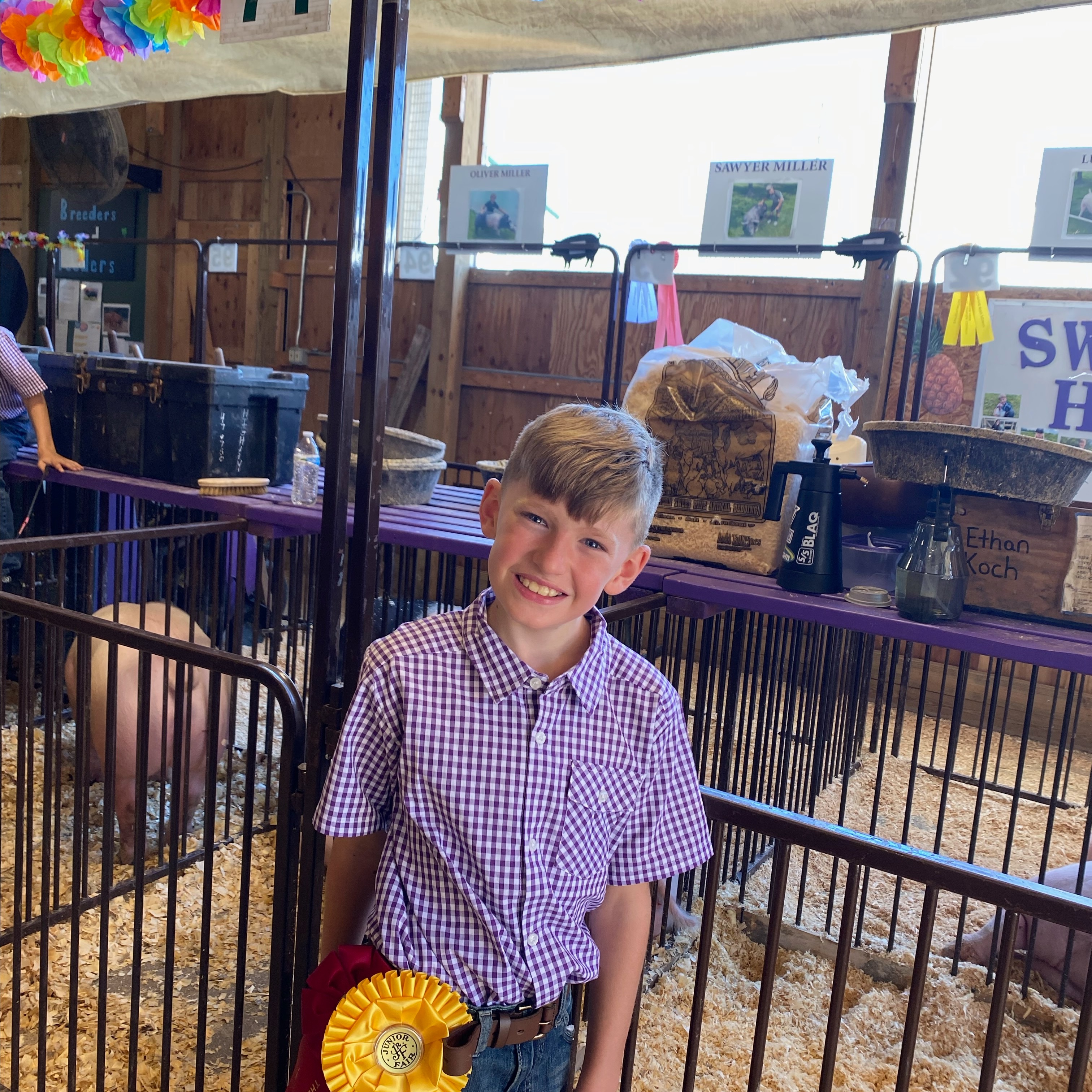 Ethan K. shows pigs at the Geauga County Fair. 