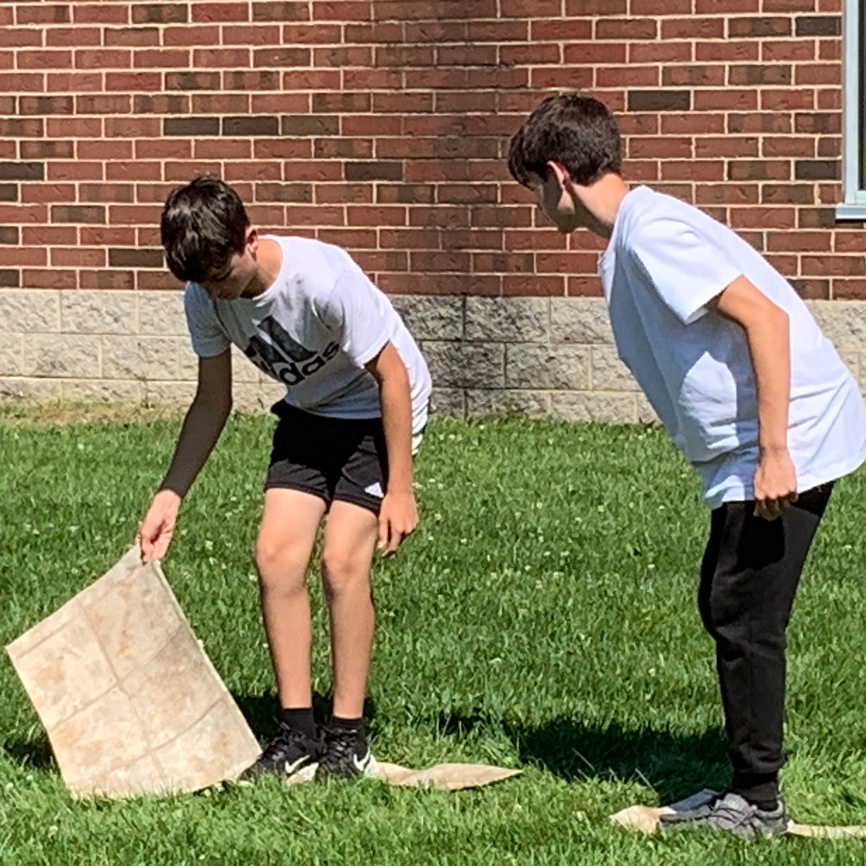 Students in Mr. Sherman's Social Studies class had to work together to accomplish a common goal of getting across the "lava."