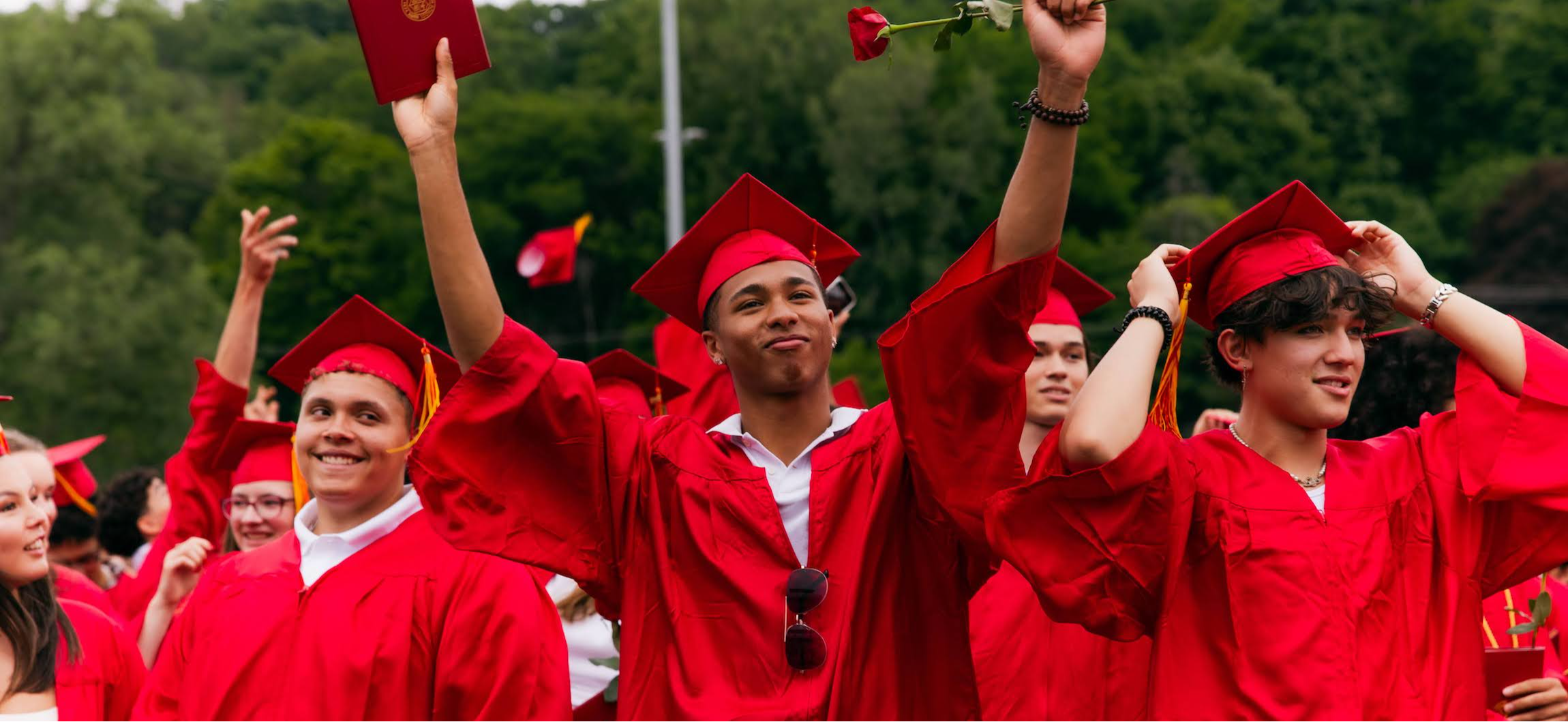 Students celebrating at 2024 IHS graduation ceremony