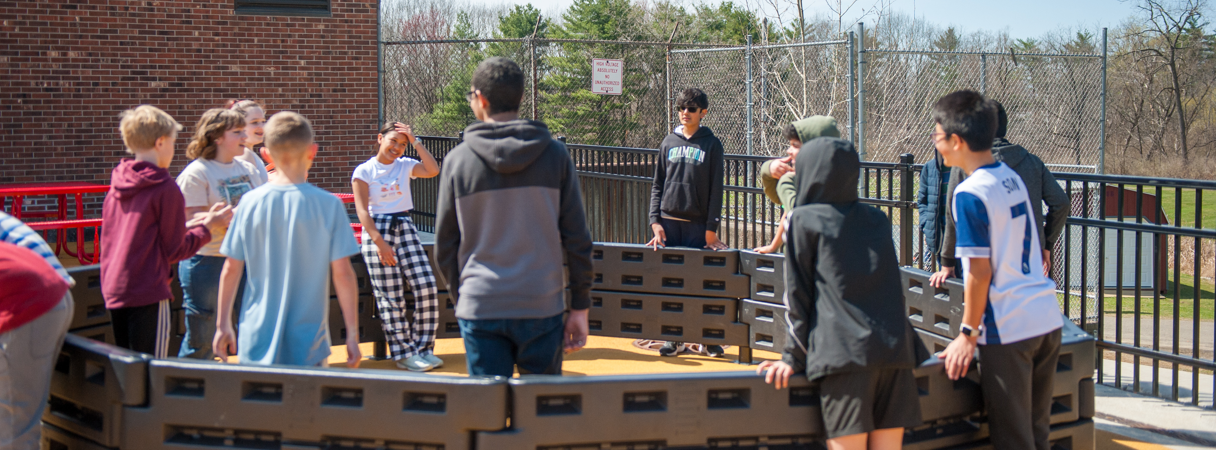 DeWitt students playing in the gaga pit during a celebration day