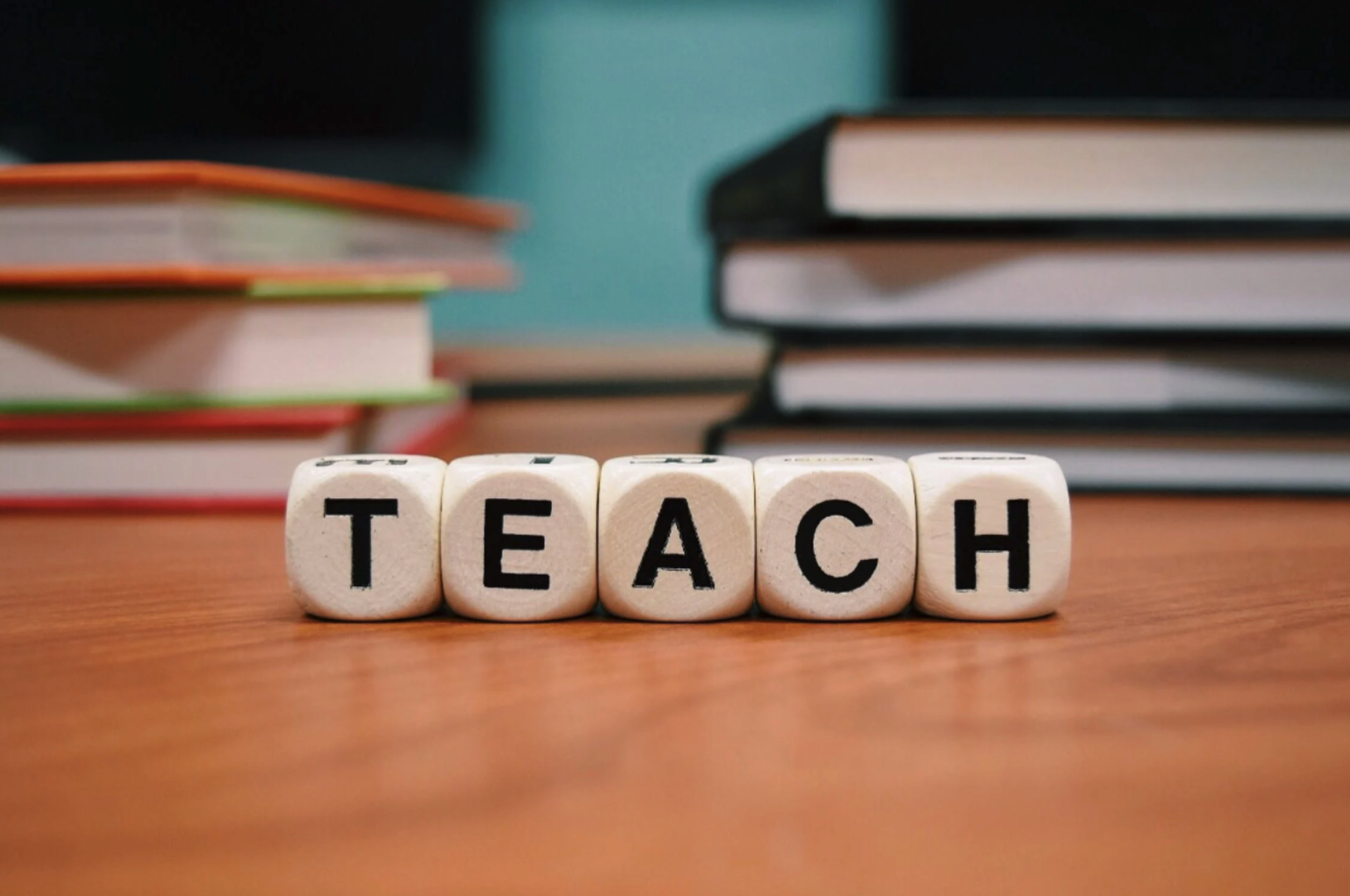 dice spelling the word teach