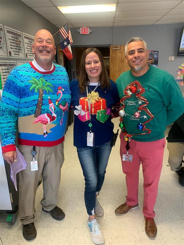 Teacher wearing ugly sweaters